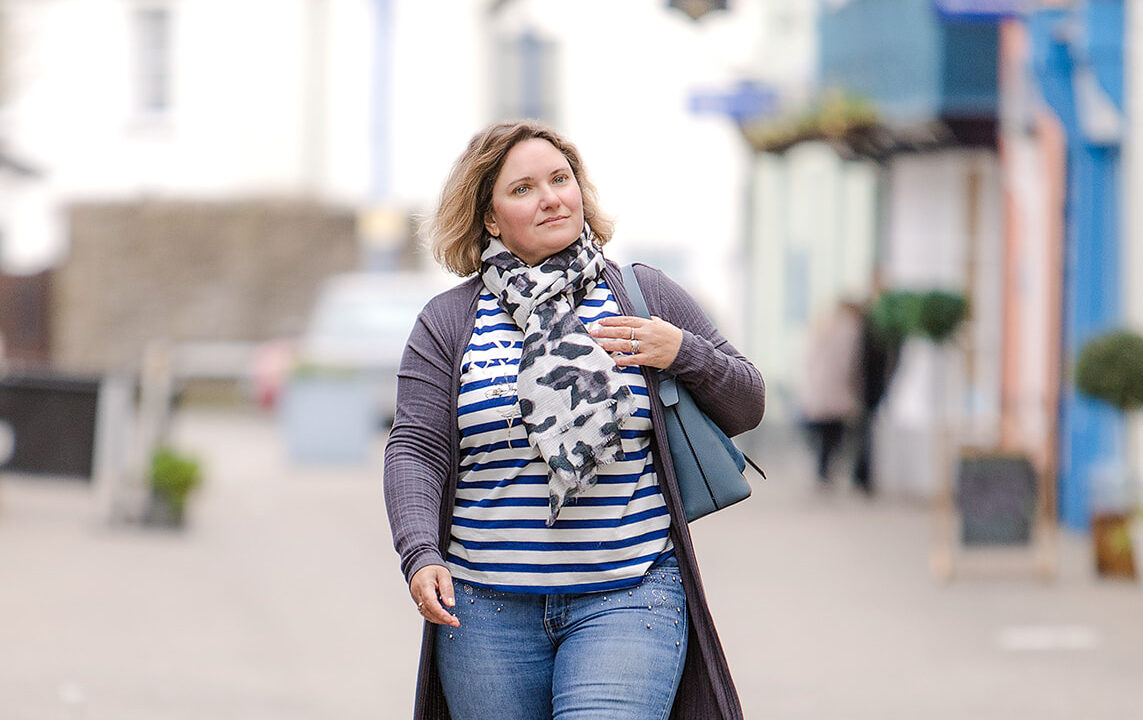 Sian walking through a street in Abergavenny